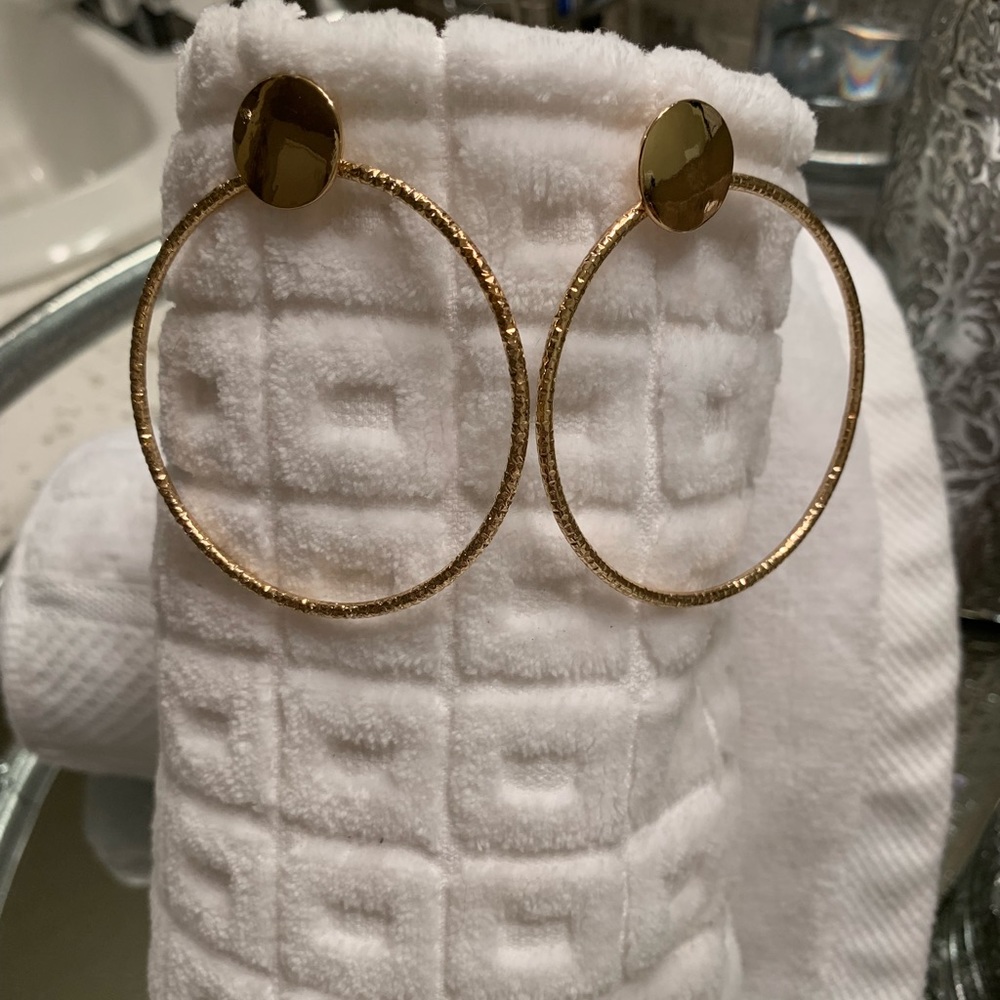 Gold hoop earrings with stud back